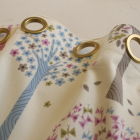 Pretty eyelet headings in matt gold