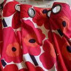 Eyelet headings for a pole in a child&#039;s bedroom. Fabric is by Marimekko.